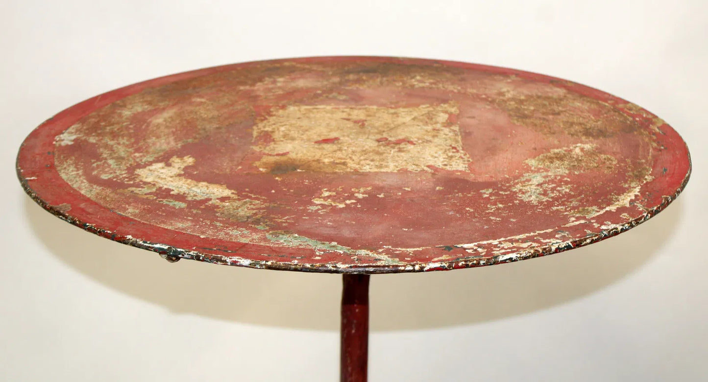 French painted red metal gueridon garden table, c 1910